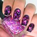 Nail polish - "Super Vixen" purple and pink dot glitter in a clear base