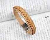 A tan leather bangle bracelet with braid leather in silver magnetic closure TS171