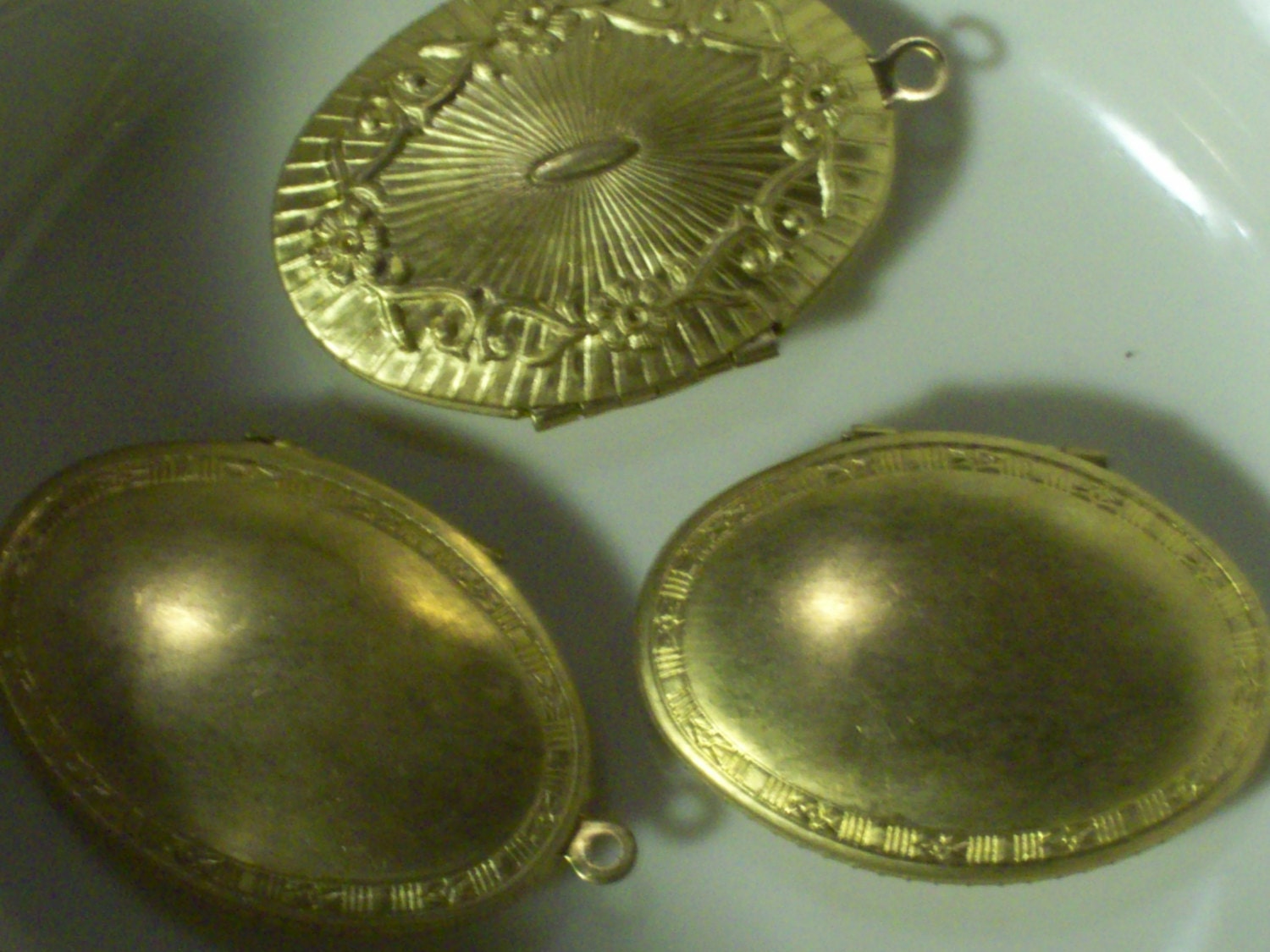 Locket, Vintage Hong Kong, circa 1970, brass, large, oval, floral both sides, for jewelry making and necklaces, holds photos