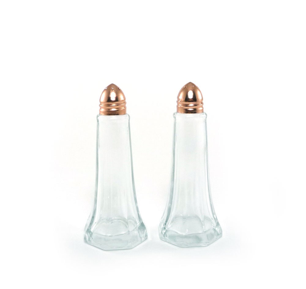 Vintage glass salt and pepper shakers with copper lids