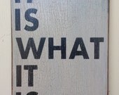 Wooden sign It is what it is sign made from reclaimed plywood