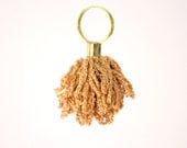 brass ring with crochet flower in sand color
