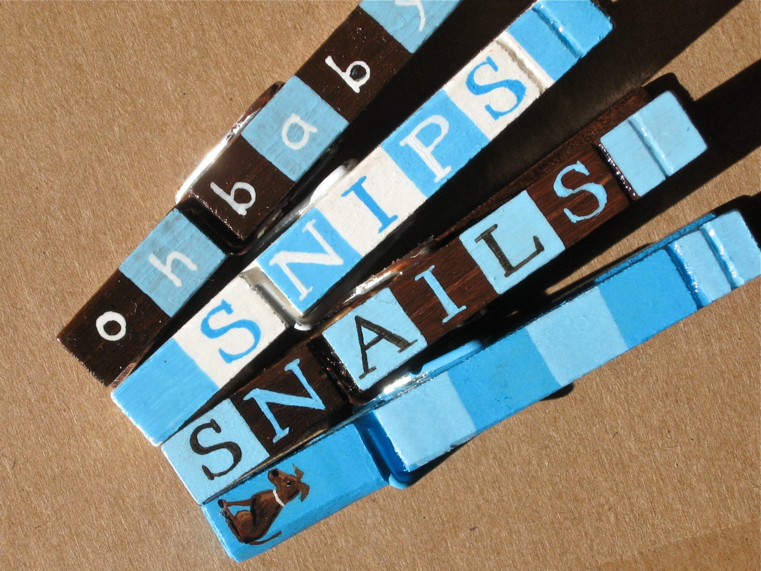 SNIPS and SNAILS and puppy-dog tails hand painted clothespin magnet