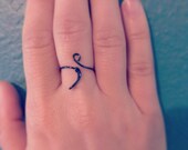 Semicolon ring