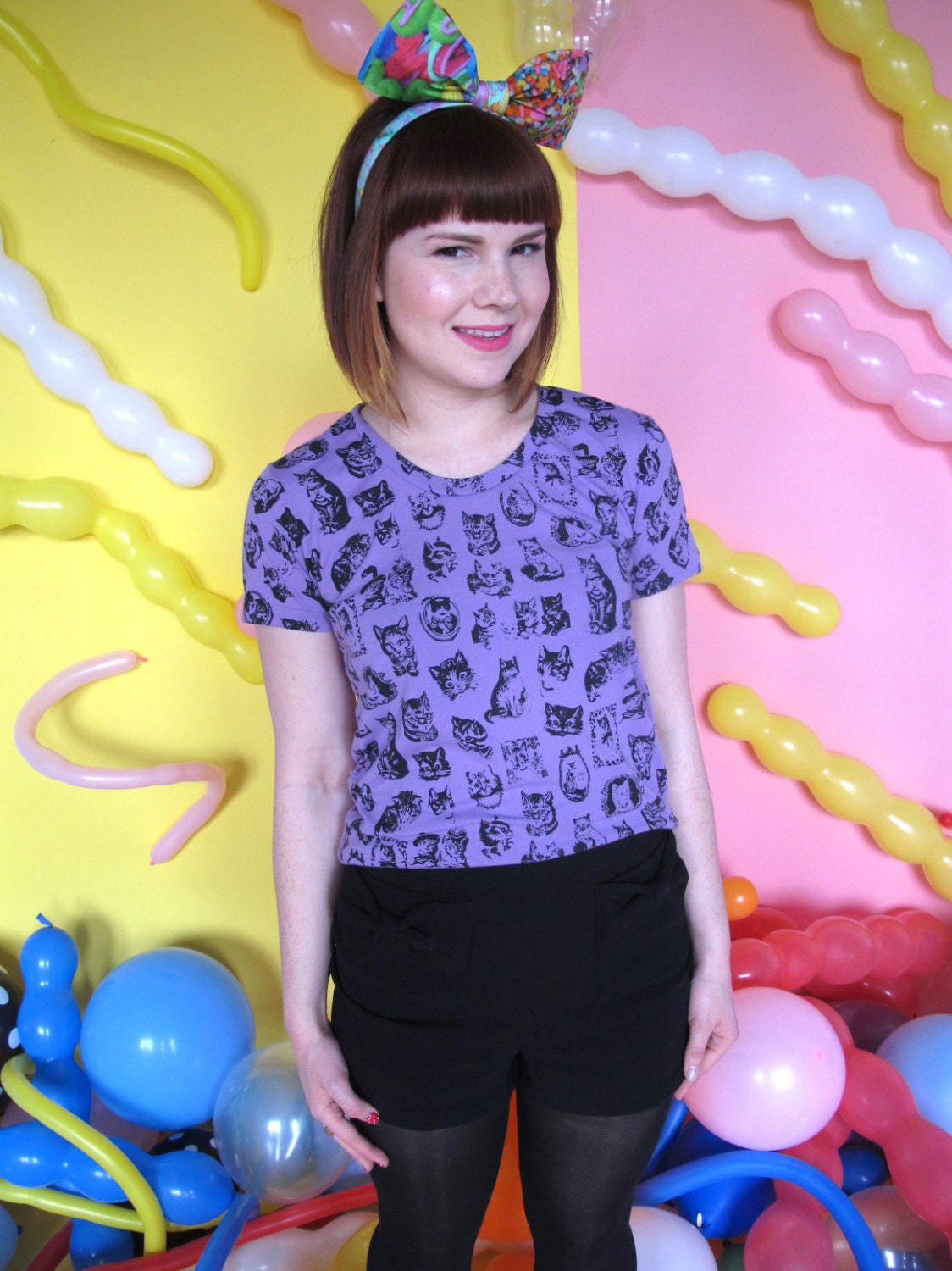 Lilac Cute Cat T Shirt. Medium