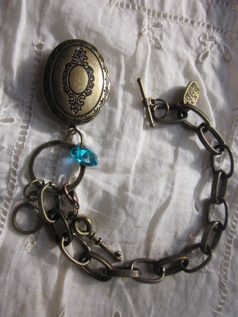 Antique Bronze Bracelet with a Classic Oval Locket Pendant, Swarosvki Crystal Heart Bead, Antique Bronze Key Charm
