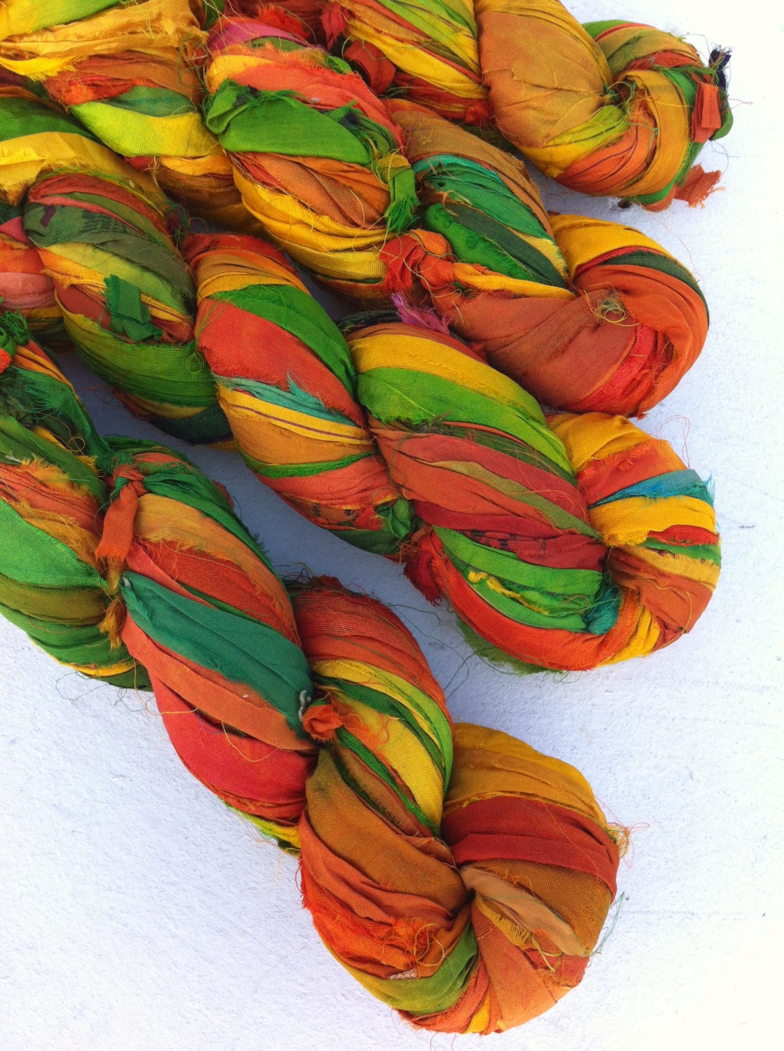 Recycled sari silk ribbon. Space dyed. Manas. Beautiful quality pure silk sari yarn. Unique ethical art yarn.