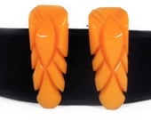 Beautiful Pair of Carved Pumpkin Bakelite Dress Clips