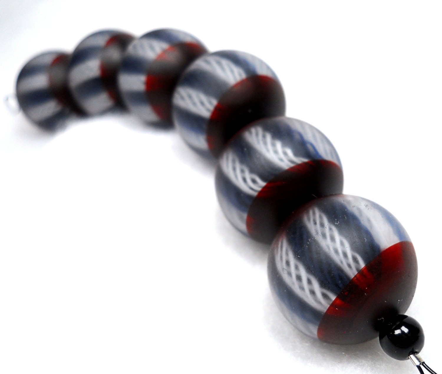 American Trade Bead - Texas - Strand of 6 marble beads. Solid boro glass lampwork.
