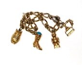 Vintage Avon Charm Bracelet with Four Darling Charms 1973