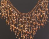 Native American style tribal fringed collar necklace with gold and copper pearls