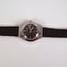Vintage 1978 Timex Electric Retro Mens Wrist Watch in Silver Case W/Sweep Second Hand & Roman Numerals Black Leather Band