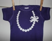 The Carrie Pearl Necklace with Bow in Purple