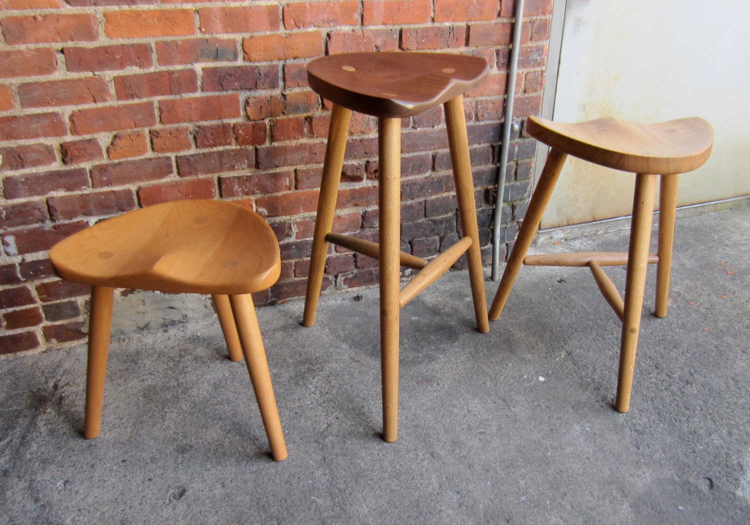 Stool made in sustainably sourced black walnut.