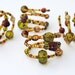 Spiral Beaded Napkin Rings - Set of Four - Green