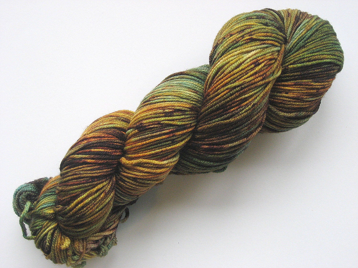 Blue, Green, Gold, and Brown 8-ply DK Weight 100% Merino Hand-dyed Yarn, 274 yds. 'Captain Jack'