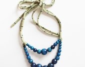 Color Pop Necklace in Vanilla & Cream . Non-toxic Beads with a Jersey Tie . Fashionable and baby-friendly