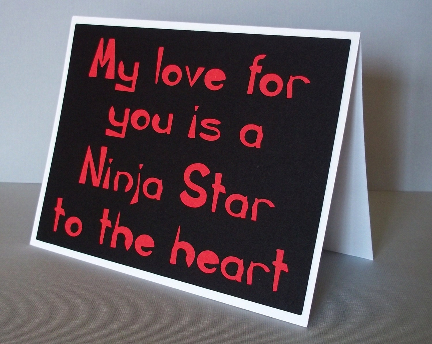 My love for you is a Ninja Star to the heart - Black Card with Red lettering- Ninja awesomeness inspired