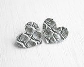 Reptile leather heart earrings with metallic effect