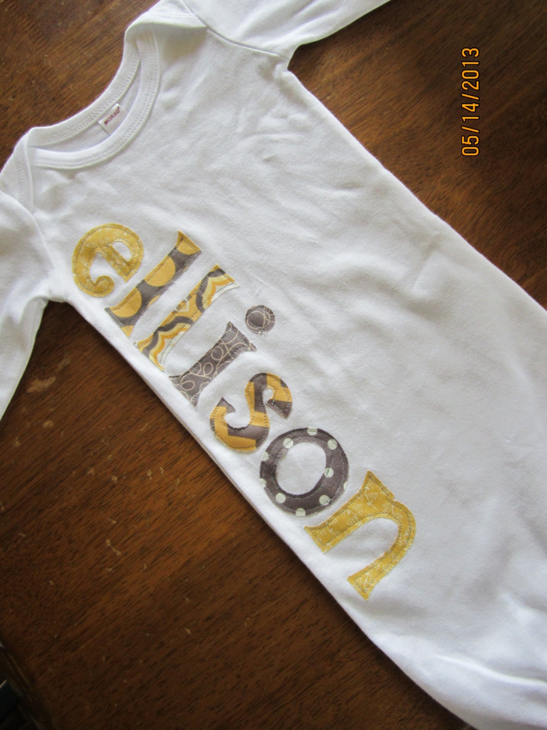 Adorable Baby Newborn Sleep Gown with babies name appliqued in yellows and grays