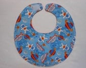 Baby bib, four soft layers, reversible, blue with space ships