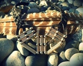Naitria - leather statement necklace. modern geometric necklace
