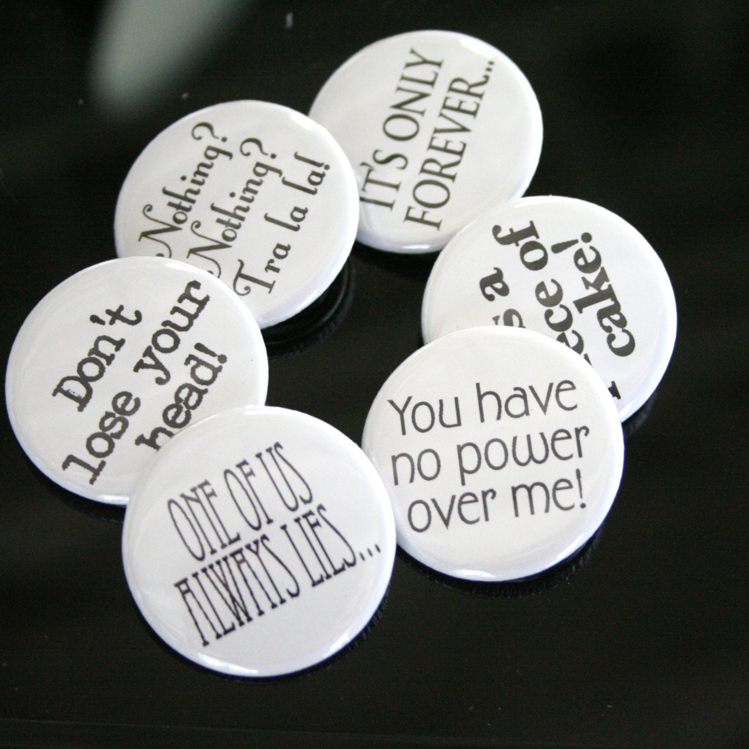 Labyrinth button set of 6 1.25" buttons. Piece of cake, only forever, tra la la, lose your head, no power over me, one of us lies...