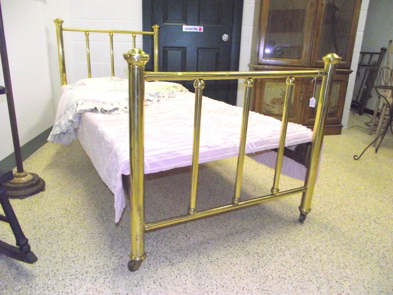 Antique early 1900s Brass Bed Twin size Rolling Casters