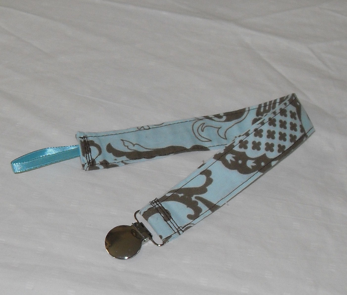 Michael Miller Botanika Wink Wink Aqua Pacifier Clip
