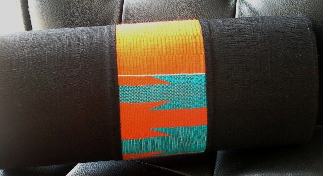 Orange and blue kente on black clutch by Gitas PORTAL