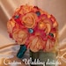 Shades of Coral Real Touch Roses Wedding Bouquet with Either Large or Smaller Teal Crystal Accents and Satin Hand Tied Stems.