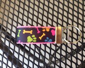 Bright Paw Prints and Bones Keychain Fob
