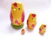 I have a beak and you don't....  Vintage wooden nesting bird dolls