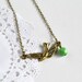 Flying Bird Necklace, Gold Colored Bird Jewelry, Green Czech Glass Bead and Sparrow, Canadian Jewelry