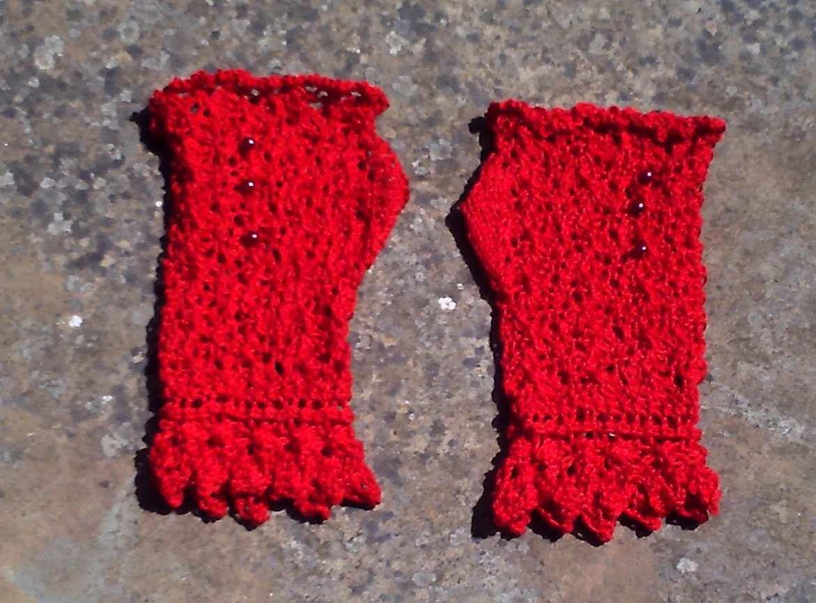 Women's / teenager  hand knitted wrist warmers / fingerless gloves.Small to medium.