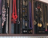 Jewelry organizer with stud slots and ring cubbies