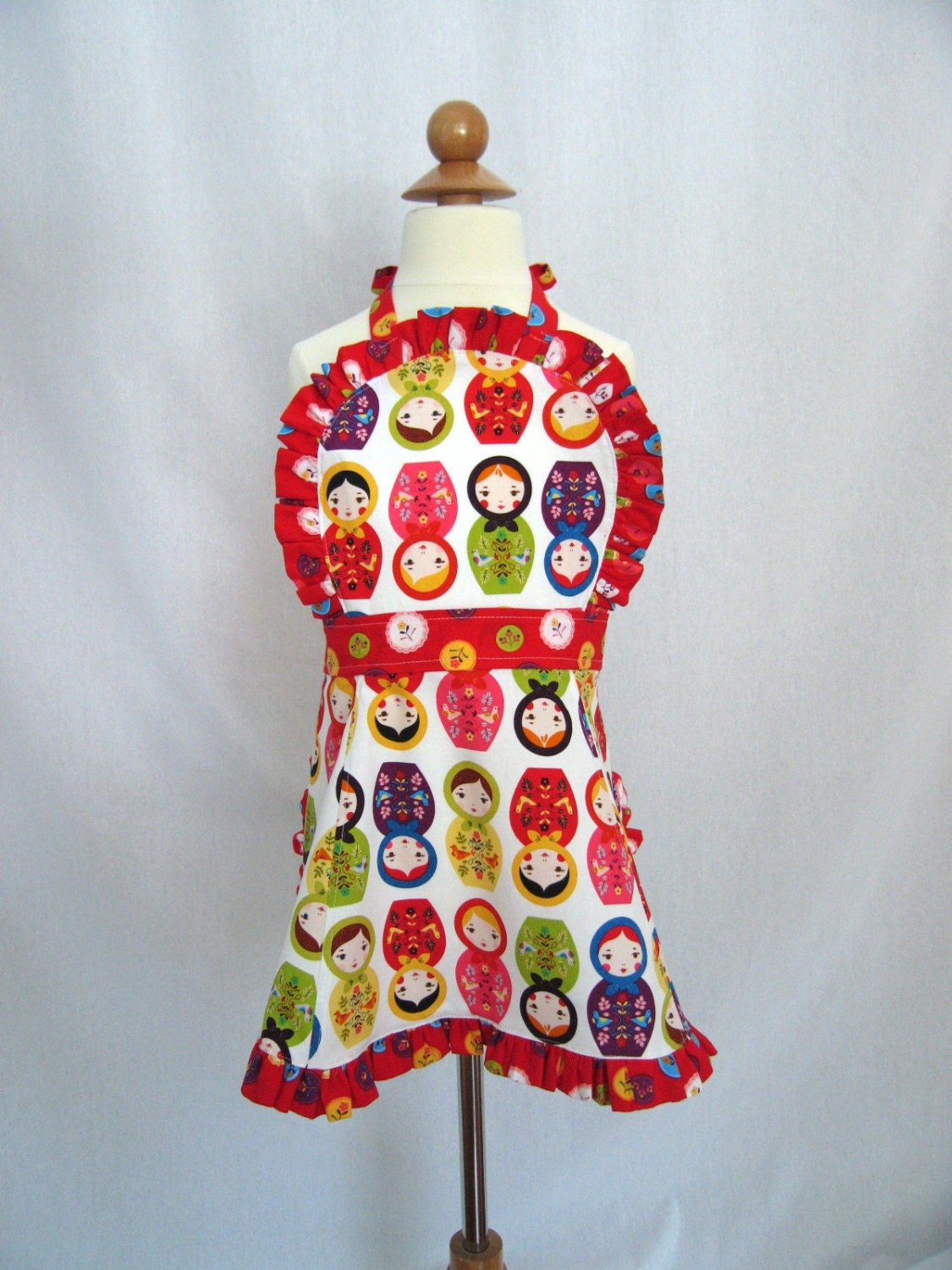 Little Girl's Ruffled Apron with Stacking Matryoshka Dolls - Kaufman Little Kulka Fabric
