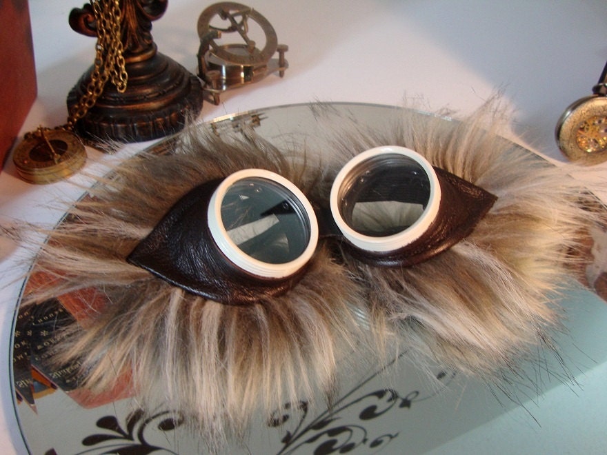 Dark Brown cowhide leather goggles with  island raccoon faux fur trim burning steampunk man