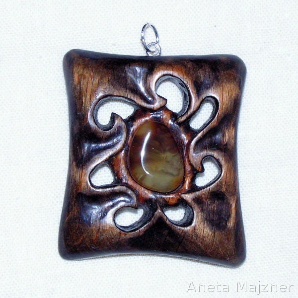 Wood carving Artistic jewellery Unique wooden pendant with natural baltic amber