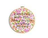 A garden and a library embroidery hoop wall art