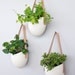 Set of 3 porcelain and leather hanging containers