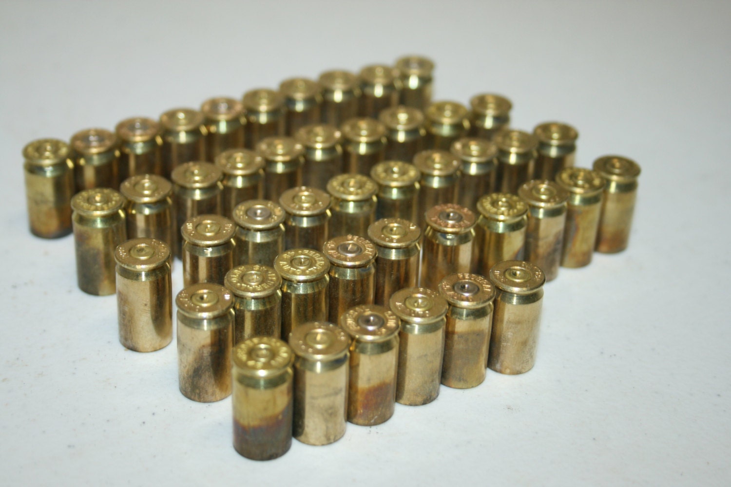 46 pieces of 45 auto,45,45 auto,45 bullet casings,45 bullet shells,empty bullet casings,45 bullet shells,brass casings,bullet brass casing