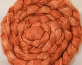 Hand- dyed tussah silk roving -  Persimmon  ( 3.2 oz.)