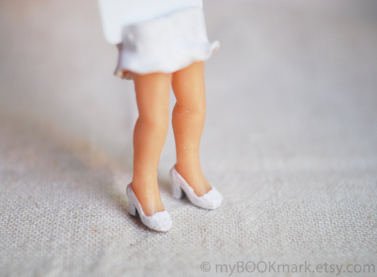 Marilyn Monroe legs in the book. Sexy book marker in white shoes. For him, dude, dad, boss, ohtteam