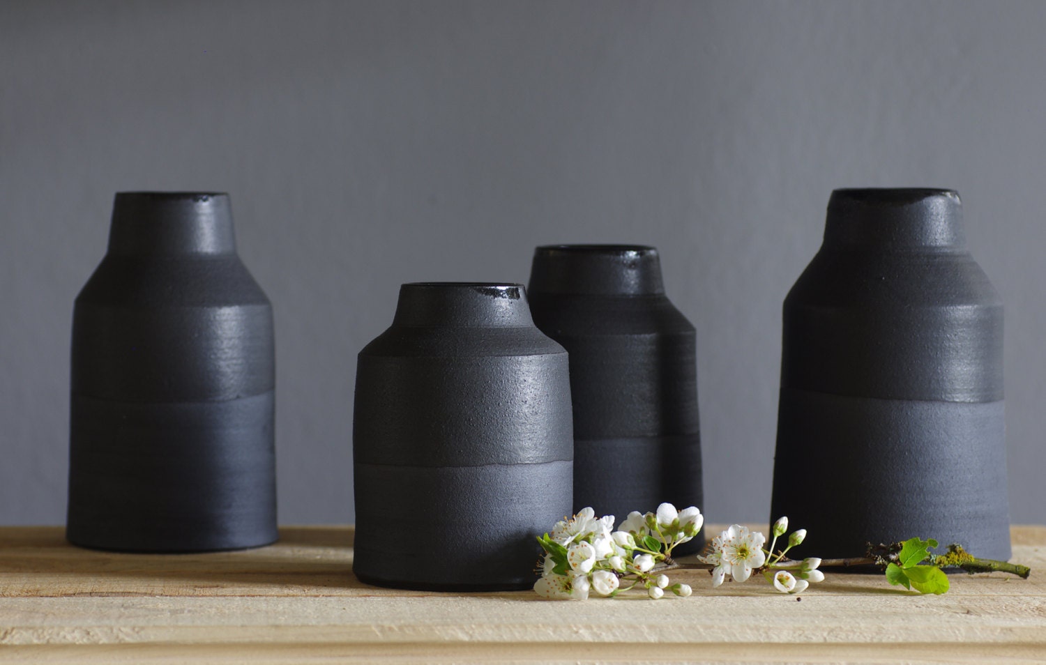 one black vase. matte black stoneware bottle / vase. modern minimal pottery ceramic