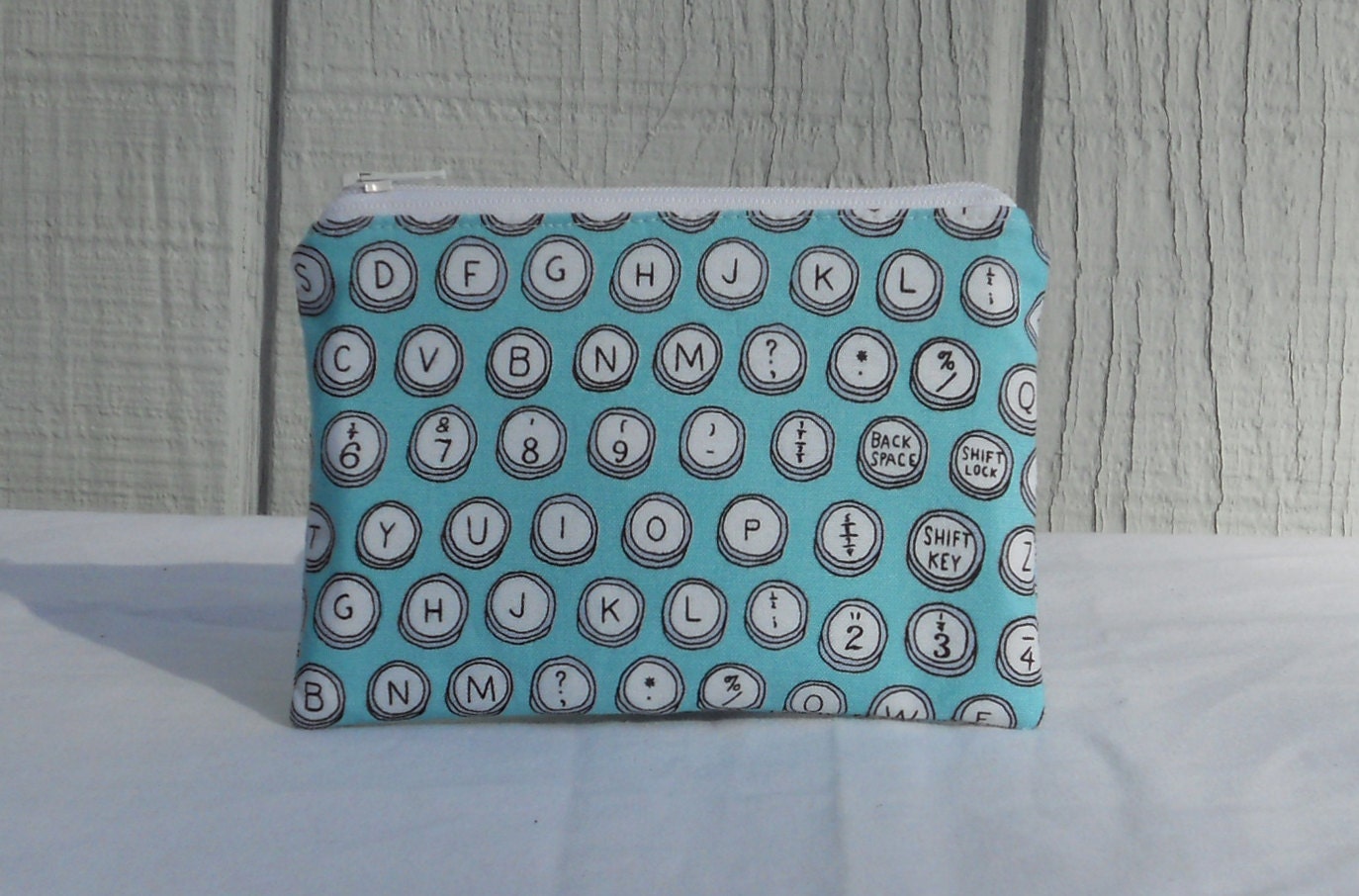 Zipper pouch, blue typewriter keys