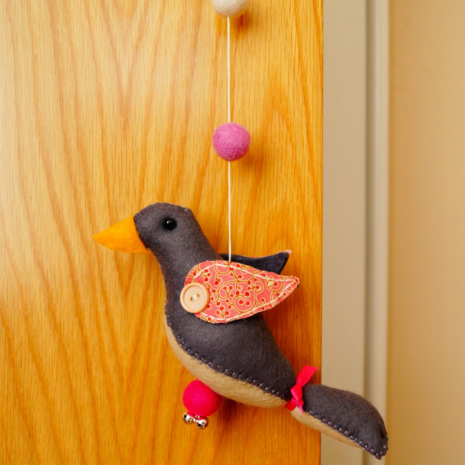 Girlie Felt Bird hanging, handsewn felt bird, grey cream pink, silver jingle bells, felt balls