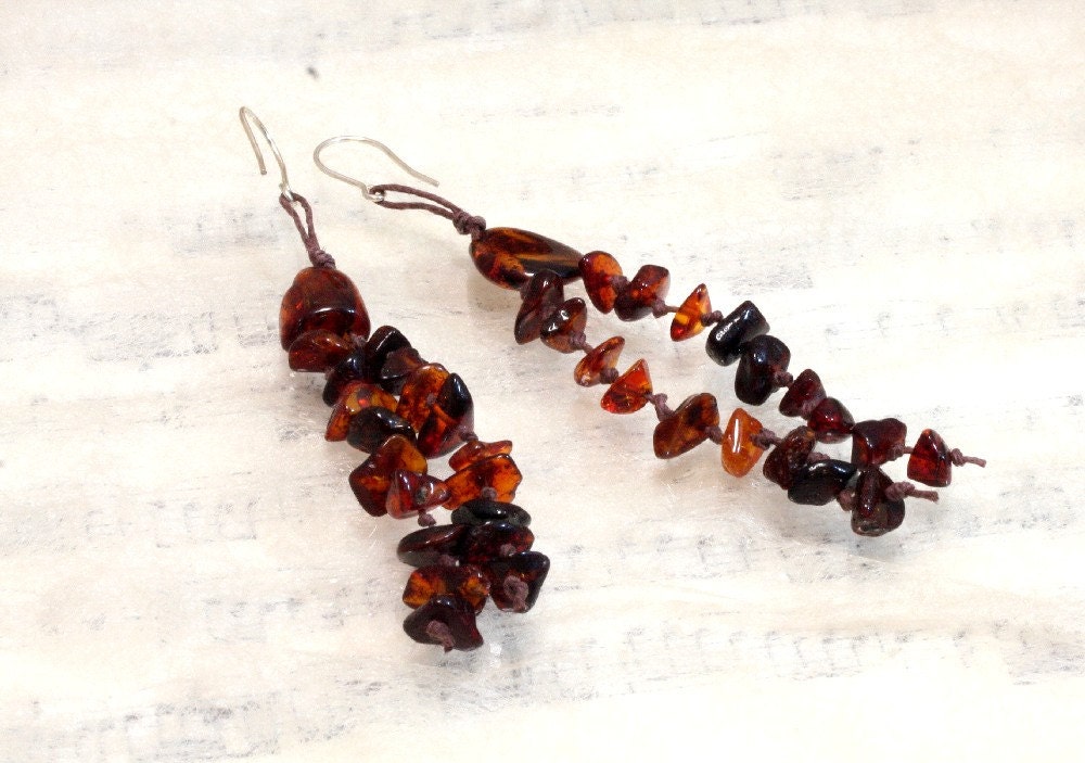 Dangling dark amber knotted earrings
