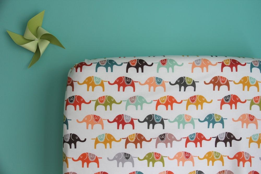 fitted crib sheet in colorful elephants