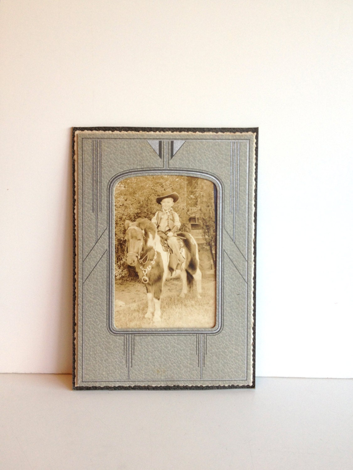 Vintage Boy on Pony Sepia Tone Photo